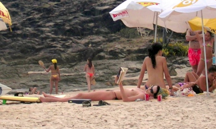 Charlize Theron Topless at the beach in Brazil